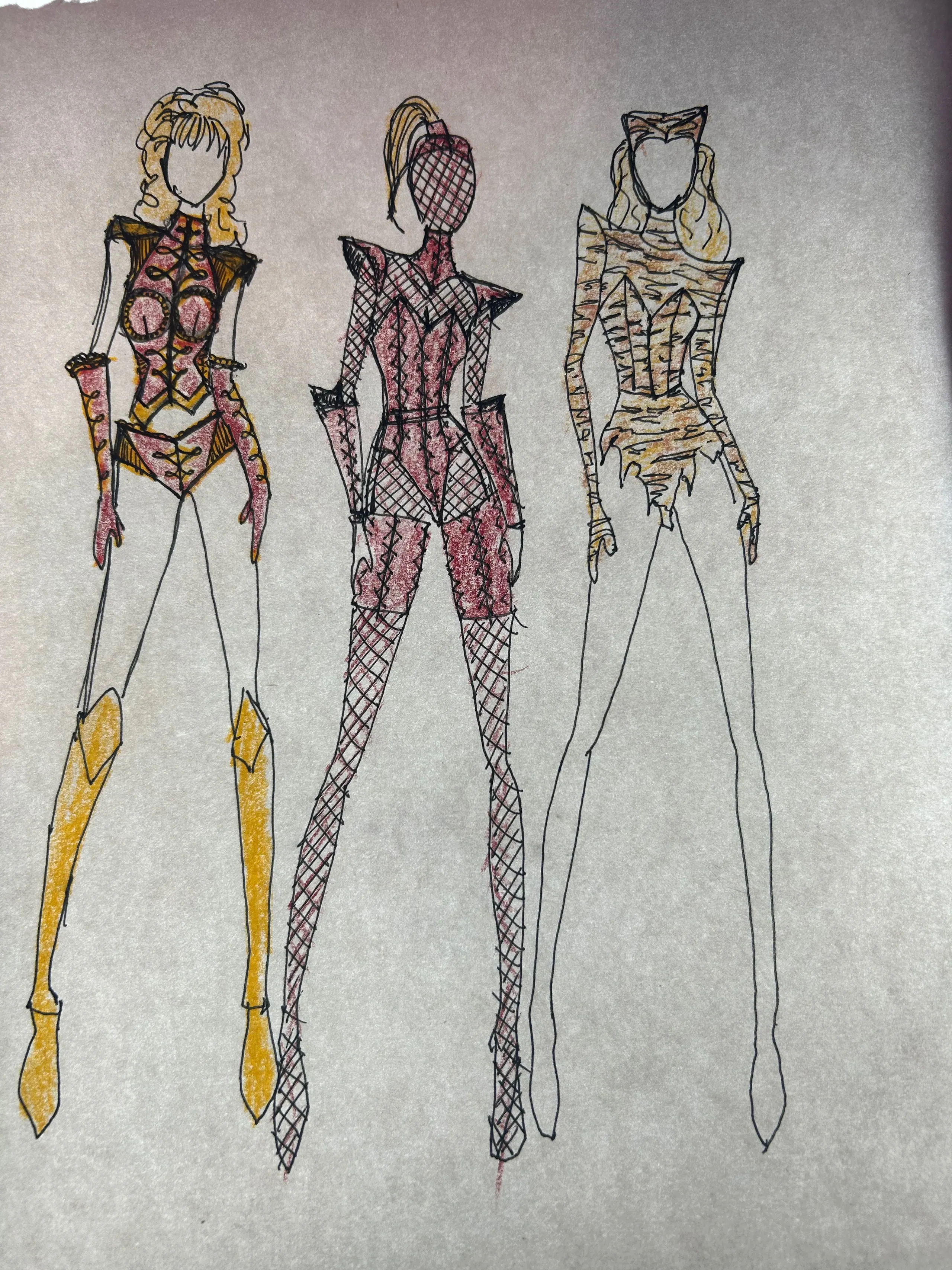 Three hand-drawn costume sketches on paper
